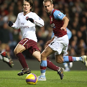 Tomas Rosicky (Arsenal) Olof Mellberg (Aston Villa)