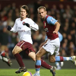Tomas Rosicky (Arsenal) Olof Mellberg (Aston Villa)
