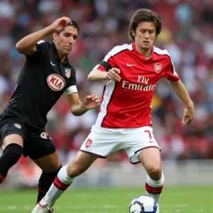 Tomas Rosicky (Arsenal) Raul Garcia (Atletico)