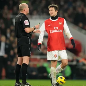 Tomas Rosicky (Arsenal) with the referee. Arsenal 2: 1 Everton. Barclays Premier League Tomas Rosicky (Arsenal) with the referee. Arsenal 2: 1 Everton. Barclays Premier League