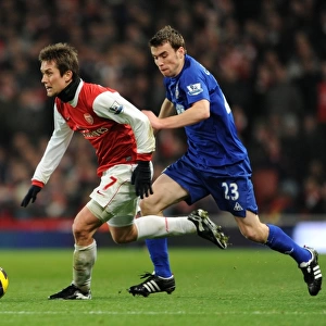 Tomas Rosicky (Arsenal) Seamus Coleman (Everton). Arsenal 2: 1 Everton. Barclays Premier League