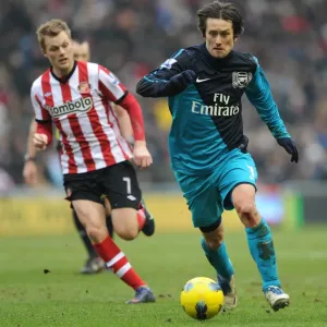 Tomas Rosicky (Arsenal) Seb Larsson (Sunderland). Sunderland 1: 2 Arsenal Tomas Rosicky (Arsenal) Seb Larsson (Sunderland). Sunderland 1: 2 Arsenal