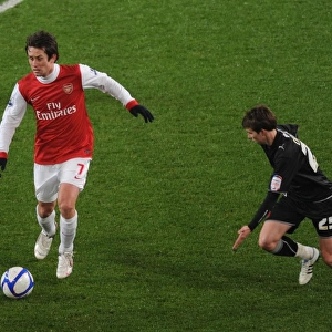 Tomas Rosicky (Arsenal) Thomas Carroll (Orient). Arsenal 5: 0 Leyton Orient
