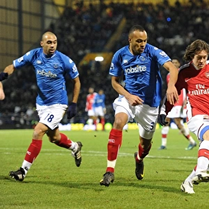 Tomas Rosicky (Arsenal) Younes Kaboul (Portsmouth). Portsmouth 1: 4 Arsenal