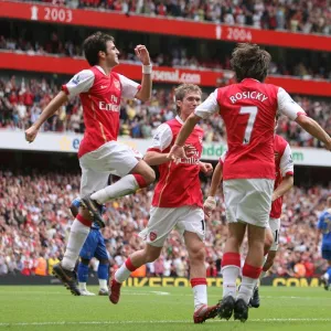 Tomas Rosicky celebrates scoring Arsenals 3rd goal with Cesc Fabregas and Alex Hleb