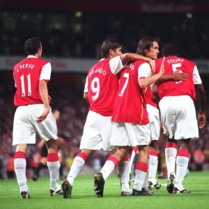 Tomas Rosicky is congratulated on scoring Arsenals 1st goal Tomas Rosicky is congratulated on scoring Arsenals 1st goal