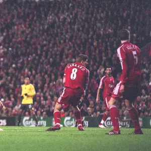 Tomas Rosicky shoots past Liverpool captain Steven Gerrard to score the 1st Arsenal goal