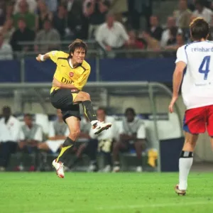 Tomas Rosicky shoots past substitute goalkeeper Stefan Wachter to score the 2nd Arsenal goal