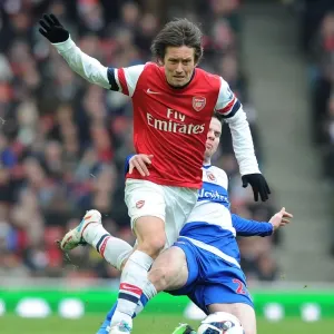 Tomas Rosicky's Slick Moves: Outmaneuvering Danny Guthrie in the 2012-13 Arsenal-Reading Match