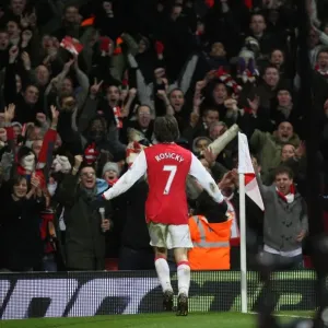 Tomas Rosicky's Thrilling Goal: Arsenal Fans Go Wild as Gunners Lead 2:0 Over Wigan Athletic Tomas Rosicky's Thrilling Goal: Arsenal Fans Go Wild as Gunners Lead 2:0 Over Wigan Athletic