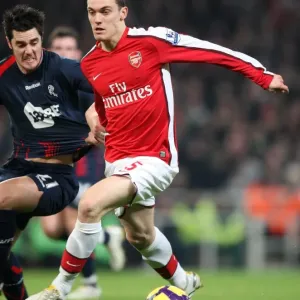 Tomas Vermaelen (Arsenal) Tamir Cohen (Bolton). Arsenal 4: 2 Bolton Wanderers Tomas Vermaelen (Arsenal) Tamir Cohen (Bolton). Arsenal 4: 2 Bolton Wanderers