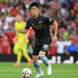 Tomiyasu Stands Firm: Arsenal's Defensive Hero at Old Trafford vs. Manchester United (2022-23 Premier League) Tomiyasu Stands Firm: Arsenal's Defensive Hero at Old Trafford vs. Manchester United (2022-23 Premier League)