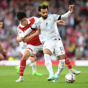 Print of Takehiro Tomiyasu Stifling Mohamed Salah Print of Takehiro Tomiyasu Stifling Mohamed Salah