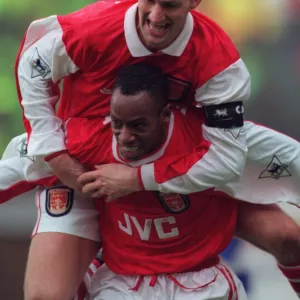 Tony Adams and Ian Wright celebrate an Arsenal goal