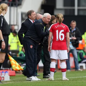 Tony Gervaise the Arsenal Assistant Manager talks to Kim Little