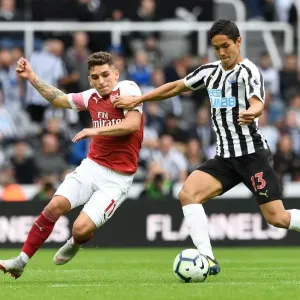 Torreira vs Muto: A Fierce Battle in Newcastle United vs Arsenal FC Premier League Clash - The Duel at St. James Park