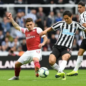 Torreira vs Muto: Intense Battle in Newcastle United vs Arsenal FC Premier League Clash