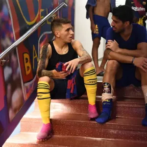 Torreira vs. Suarez: A Star-Studded Showdown in FC Barcelona vs. Arsenal Pre-Season Friendly (2019-20)