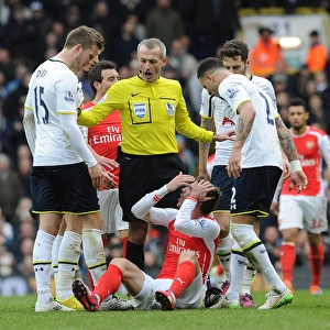 Tottenham vs. Arsenal: Intense Rivalry in the Premier League (Nacho Monreal Surrounded by Tottenham Players)