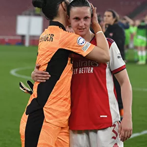 Triumphant Embrace: Arsenal Women's UEFA Champions League Victory