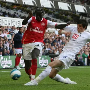 Print of Bacary Sagna and Gareth Bale in action Print of Bacary Sagna and Gareth Bale in action