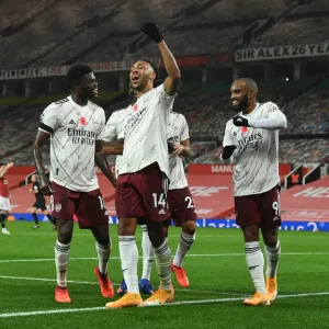 Triumphant Threesome: Aubameyang, Partey, and Lacazette's Goal Celebration - Arsenal's Victory at Old Trafford (2020-21) Triumphant Threesome: Aubameyang, Partey, and Lacazette's Goal Celebration - Arsenal's Victory at Old Trafford (2020-21)
