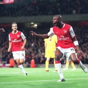 Triumphant Threesome: Gallas, Toure, and Flamini Celebrate Arsenal's 3-0 Victory Over Liverpool