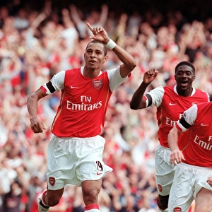 Triumphant Threesome: Gilberto, Hleb, and Toure Celebrate Arsenal's Equalizer