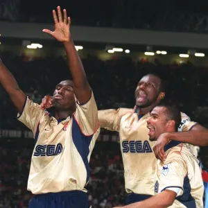 Triumphant Threesome: Vieira, Cole, and Campbell Celebrate Arsenal's Championship Win over Manchester United Triumphant Threesome: Vieira, Cole, and Campbell Celebrate Arsenal's Championship Win over Manchester United