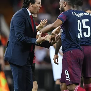 Unai Emery Coaches Alex Lacazette in Arsenal's UEFA Europa League Semi-Final Showdown with Valencia
