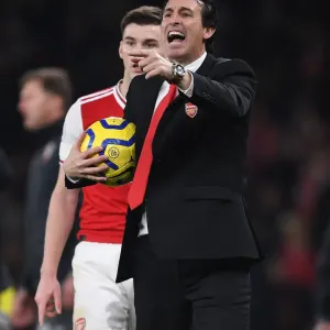 Unai Emery and Kieran Tierney: Strategic Discussions on the Arsenal Touchline during Southampton Match Unai Emery and Kieran Tierney: Strategic Discussions on the Arsenal Touchline during Southampton Match
