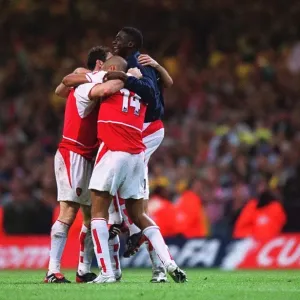 Unforgettable FA Cup Victory: Arsenal's Thierry Henry and Giovanni van Bronckhorst Celebrate (Arsenal 1:0 Southampton, Millennium Stadium, 2003) Unforgettable FA Cup Victory: Arsenal's Thierry Henry and Giovanni van Bronckhorst Celebrate (Arsenal 1:0 Southampton, Millennium Stadium, 2003)