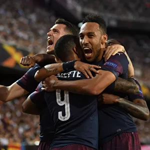 United in Victory: Aubameyang, Lacazette, and Xhaka's Goal Celebration - Arsenal's Europa League Semi-Final Triumph over Valencia