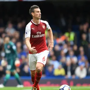 Unwavering Focus: Laurent Koscielny's Intense Concentration in the Chelsea-Arsenal Rivalry (2017-18) Unwavering Focus: Laurent Koscielny's Intense Concentration in the Chelsea-Arsenal Rivalry (2017-18)
