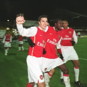 Van Persie, Adebayor, and Baptista: Celebrating a Winning Goal for Arsenal at Vicarage Road (2006)