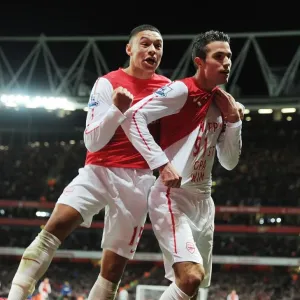 Van Persie and Oxlade-Chamberlain Celebrate Goal: Arsenal vs Manchester United, Premier League 2011-12 Van Persie and Oxlade-Chamberlain Celebrate Goal: Arsenal vs Manchester United, Premier League 2011-12