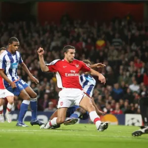 Van Persie Stuns Porto: Arsenal's First Goal in Champions League Victory