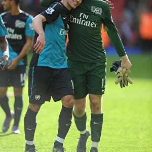 Van Persie and Szczesny: Arsenal's Unstoppable Duo Celebrate Victory at Anfield, 2012