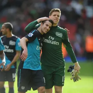 Van Persie and Szczesny: Arsenal's Unstoppable Duo Celebrate Victory at Anfield, 2012