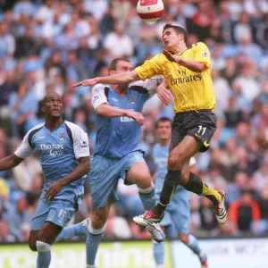 Print of Van Persie vs. Dunne, City of Manchester Stadium FA Premiership clash Print of Van Persie vs. Dunne, City of Manchester Stadium FA Premiership clash