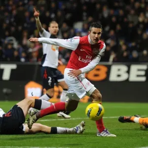 Van Persie vs. Wheater: Intense Battle at the Reebok Stadium - Arsenal vs. Bolton Wanderers, Premier League 2011-12 Van Persie vs. Wheater: Intense Battle at the Reebok Stadium - Arsenal vs. Bolton Wanderers, Premier League 2011-12