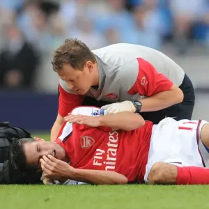 Van Persie's Agony: Manchester Derby Clash with Adebayor Van Persie's Agony: Manchester Derby Clash with Adebayor