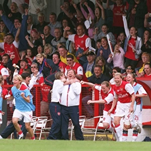 Vic Akers the Arsenal Manager celebrates at the final whistle