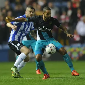 Walcott vs. Pudil: A Battle for Capital One Cup Supremacy