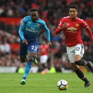 Welbeck vs Smalling: A Premier League Battle - Arsenal's Danny Welbeck Clashes with Manchester United's Chris Smalling Welbeck vs Smalling: A Premier League Battle - Arsenal's Danny Welbeck Clashes with Manchester United's Chris Smalling