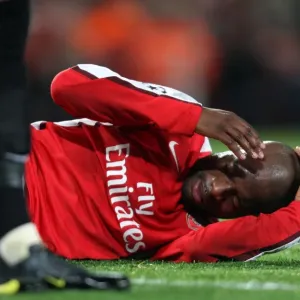 William Gallas in Pain: Arsenal's Clash of Heads with Andrey Arshavin during UEFA Champions League Match vs Standard Liege