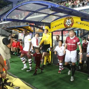 William Gallas and Tomas Repka lead out the teams before the match William Gallas and Tomas Repka lead out the teams before the match