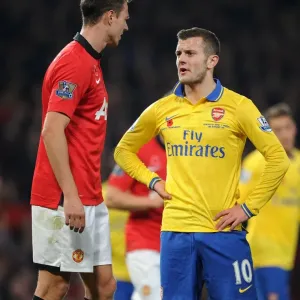 Wilshere and Evans: A Moment of Respite Amidst Manchester United vs. Arsenal Rivalry (2013-14) Wilshere and Evans: A Moment of Respite Amidst Manchester United vs. Arsenal Rivalry (2013-14)