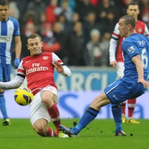 Wilshere vs Jones: Intense Battle in Wigan Athletic vs Arsenal Premier League Clash