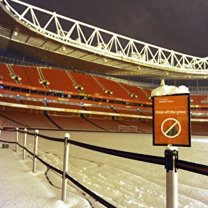 Winter's Battle at Emirates: Arsenal vs. Blackburn Rovers in a Snow-Covered Premier League